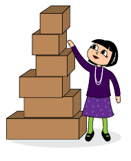 A tower made from boxes. A student stands next to the tower and raises their hand to the top.